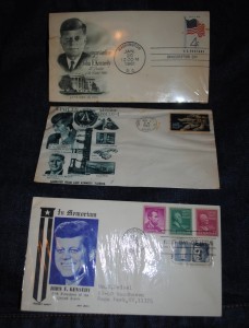 JFK envelops